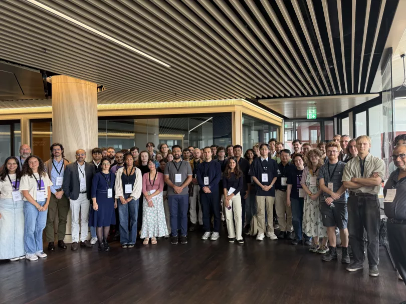 FQC 2026 participants gathered in the foyer of UCL School of Management, One Canada Square